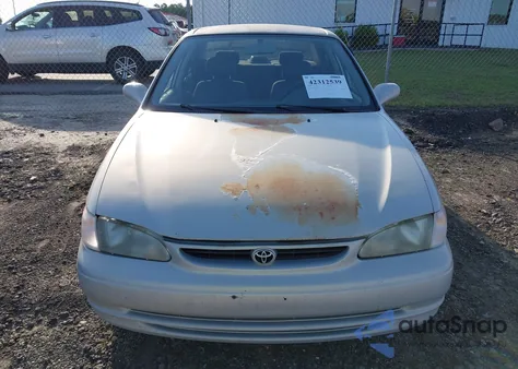 1999 Toyota Corolla Ve z USA, uszkodzony, nr VIN 1NXBR12E1XZ186613